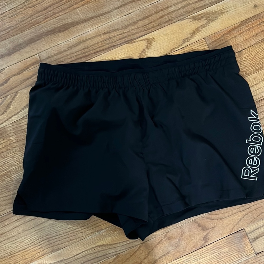 Reebok women’s running shorts. Never worn. Size L. Black